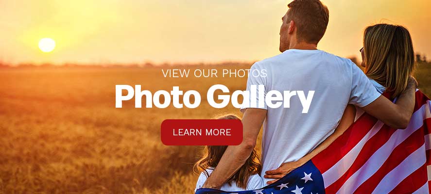photo of a family draped in the american flag
